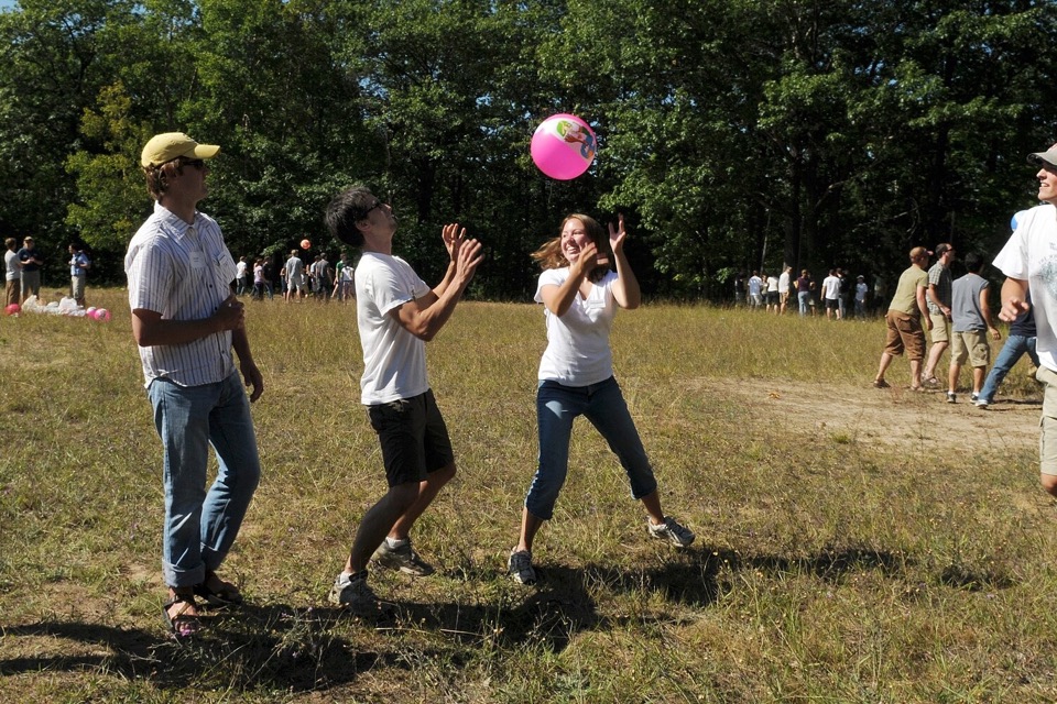 Colleagues participating in an outdoor team-building activity