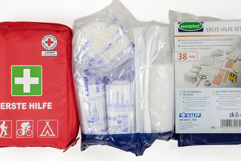 Compact first-aid kit arranged for travel preparation